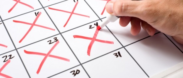 Calendar being crossed of with red crosses