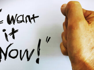 A text saying "I want it now!" and a hand clasping