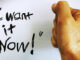 A text saying "I want it now!" and a hand clasping