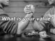 Two men arm-wrestling with text overlay saying: What is your value?