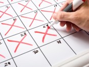Calendar being crossed of with red crosses